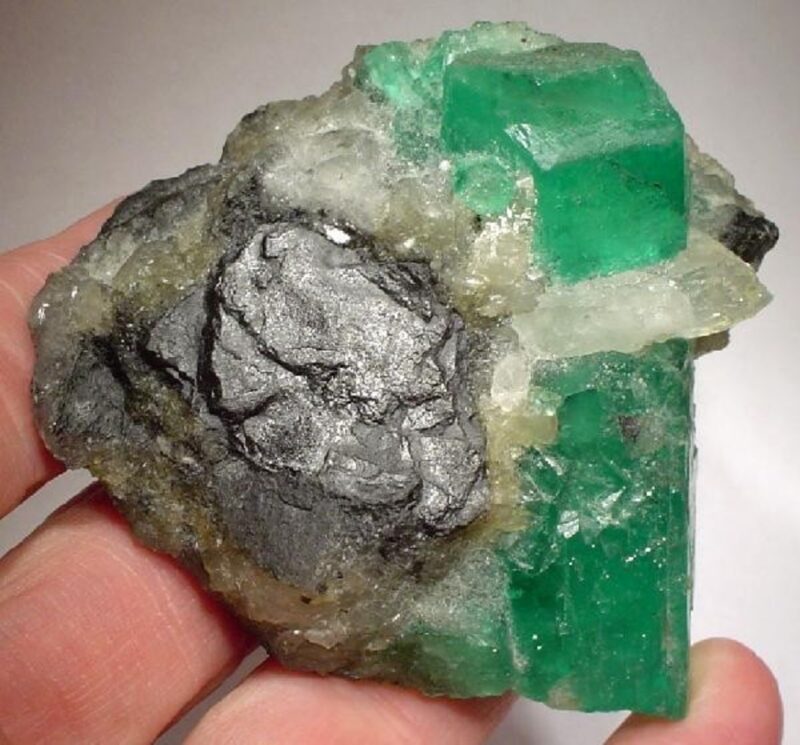 Emerald crystal in calcite and shale matrix from Colombia.